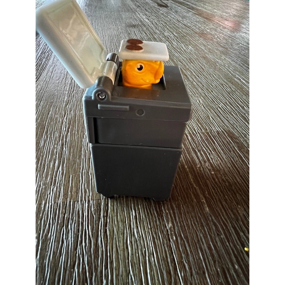 McDonalds Happy Meal Toy Yellow Character in Grey Bin Pop Up Figure 2026 TRS